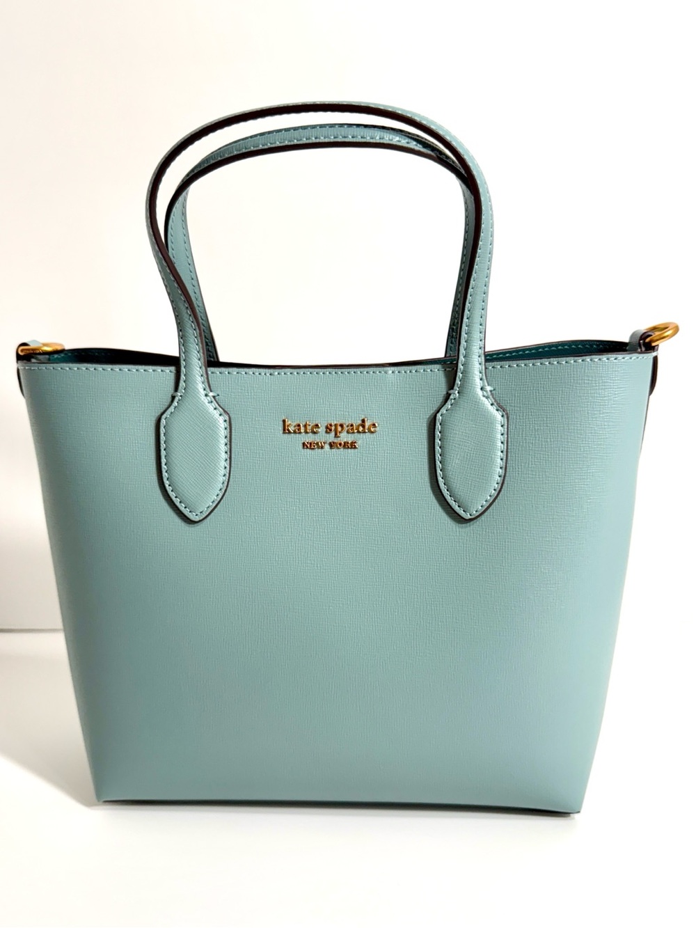 Kate Spade New York Bleecker Medium Crossbody Tote in Aegean Teal.